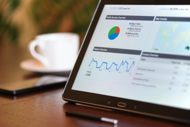 Tablet with SEO report on it.